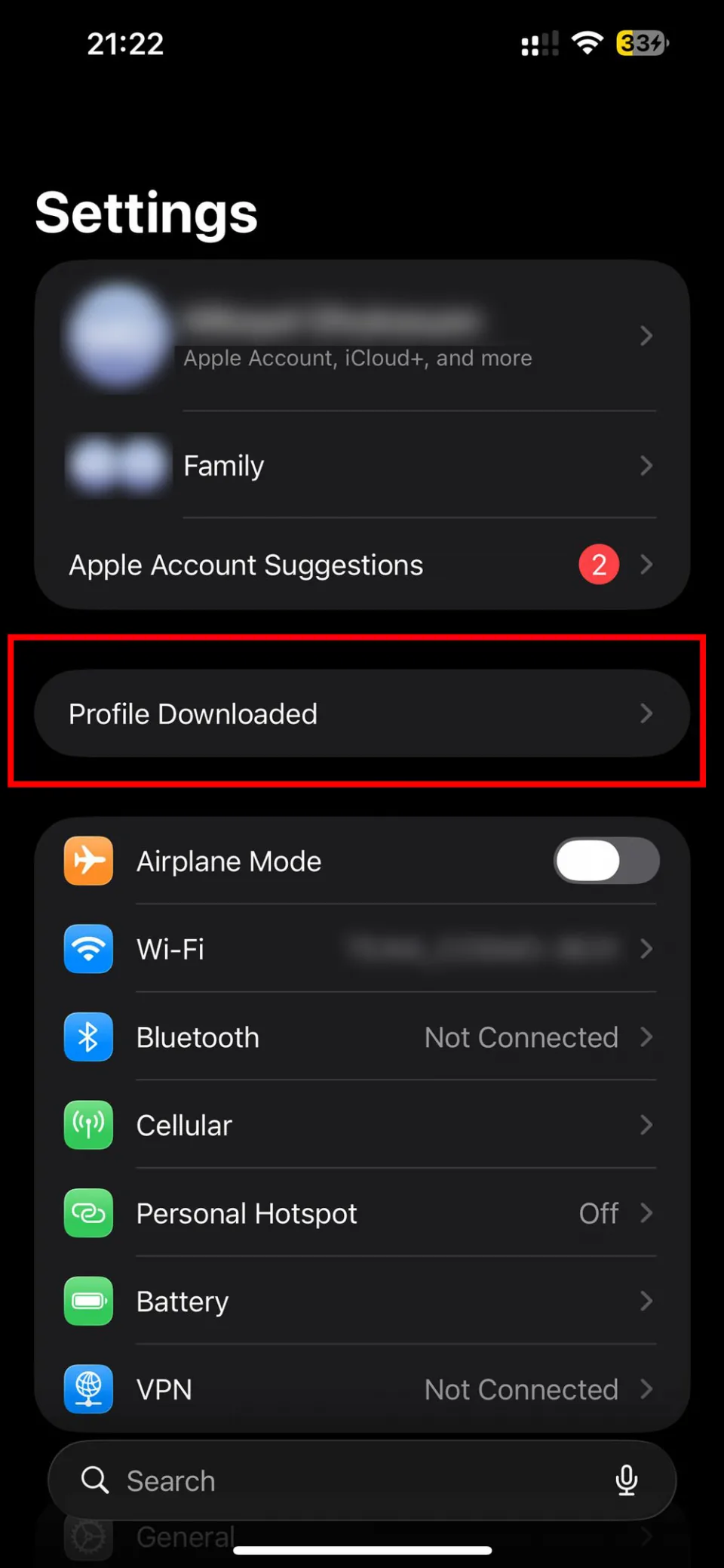Settings app on iPhone showing Profile Downloaded option highlighted