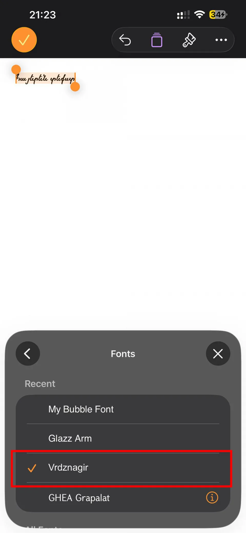 Selecting an installed Armenian font from font list in Pages app on iPhone